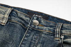 Hole Scratched Jean