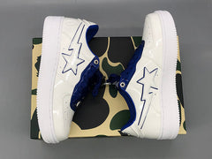 A Bathing APE  white & navy patent leather sneakers